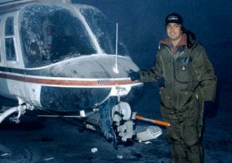 Rigging a nose-mounted camera to a Long Jet Ranger helicopter in Alaska