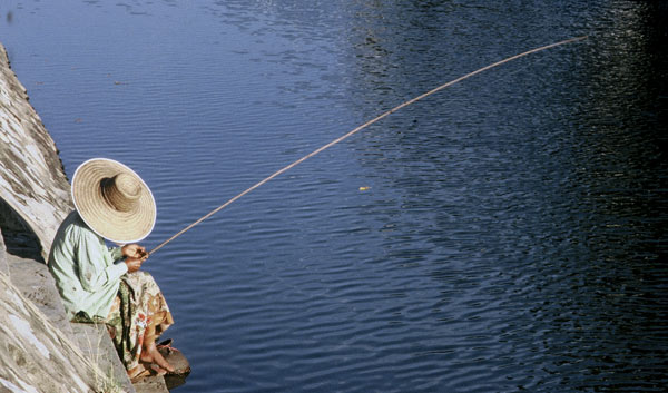 Photo of fishing in Chiang Mai, Thailand by Ron Veto