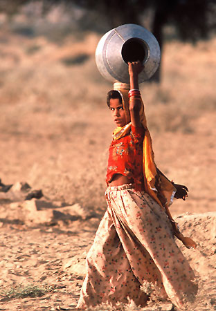 girl in desert of India by Ron Veto