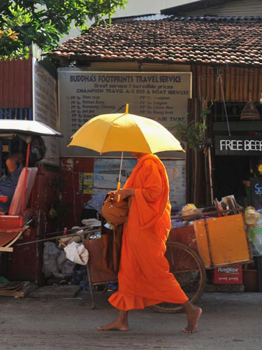 Photo of Monk in Bangkok, Thailand by Ron Veto