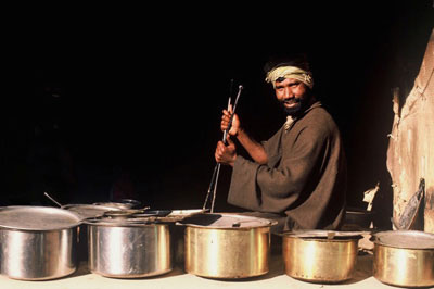 Photo of man selling cookware in Little India, Singapore by Ron Veto