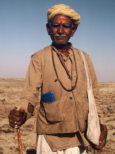 Photo of nomadic goat herder in Rajasthan, India by Ron Veto style=