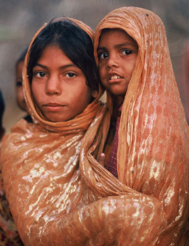 Photo of woman and child in Pakistani Desert by Ron Veto style=